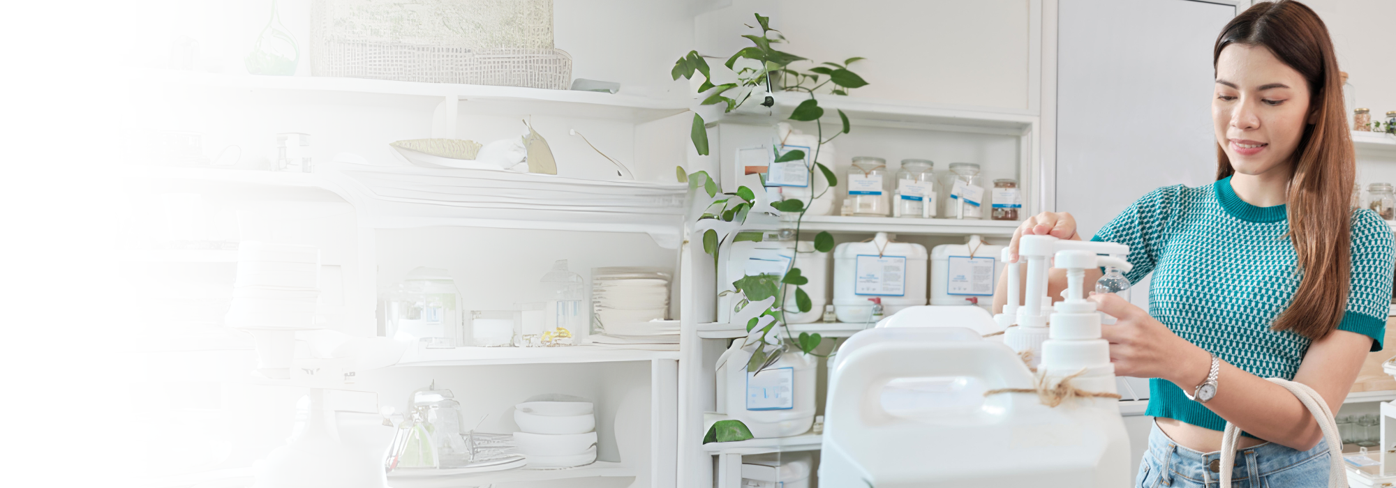 Refilling household cleaning products Woman refilling household products